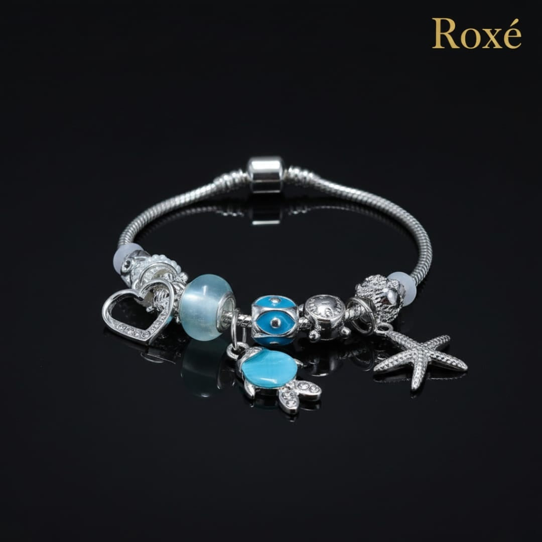 Bratara dama ROXE argintie cu charmuri pestisor si steluta, model elegant modern