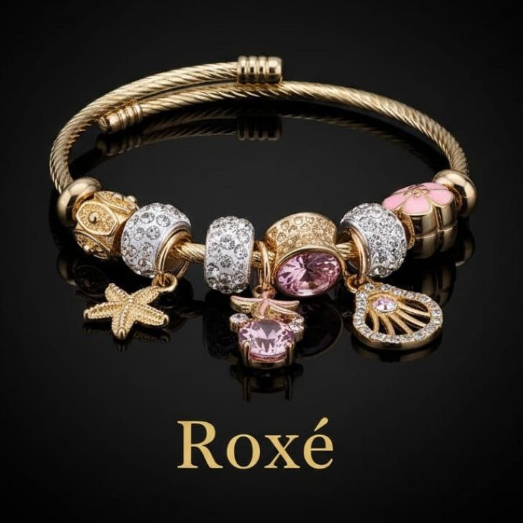 Bratara dama ROXE aurie cu charmuri marine si cristale, model elegant fashion
