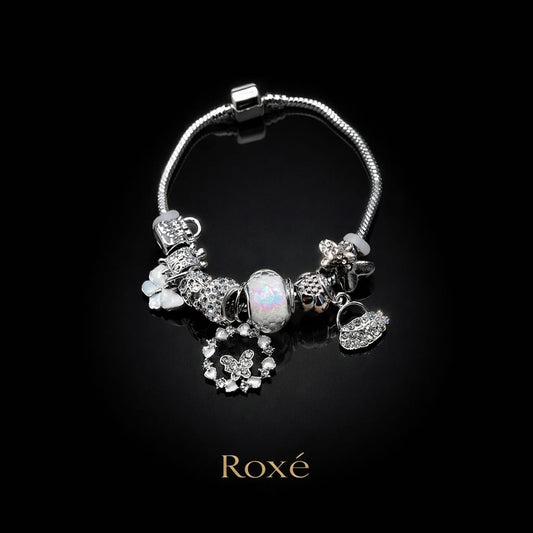 Bratara ROXE argintie cu fluture si posetuta charmuri elegante dama
