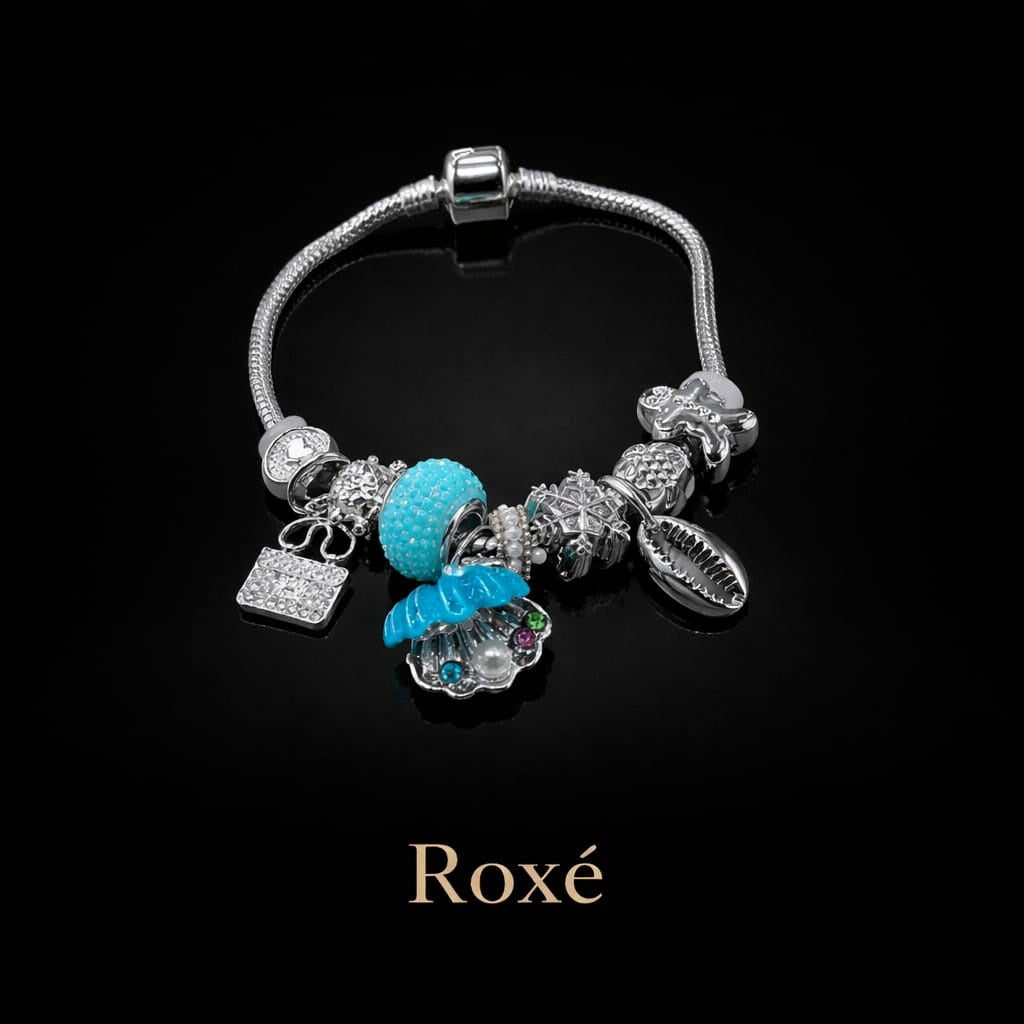 Bratara ROXE argintie cu melc scoica cu perla si fulg de nea charmuri elegante