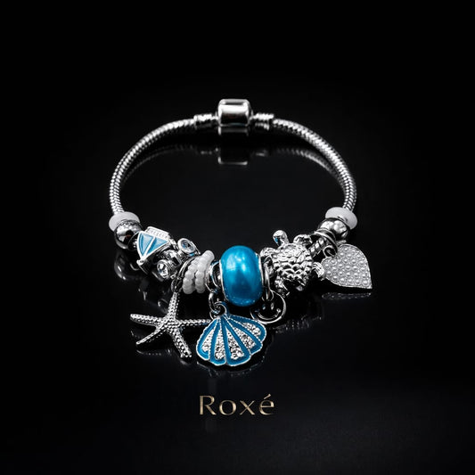 Bratara ROXE argintie cu stea de mare scoica si testoasa charmuri elegante