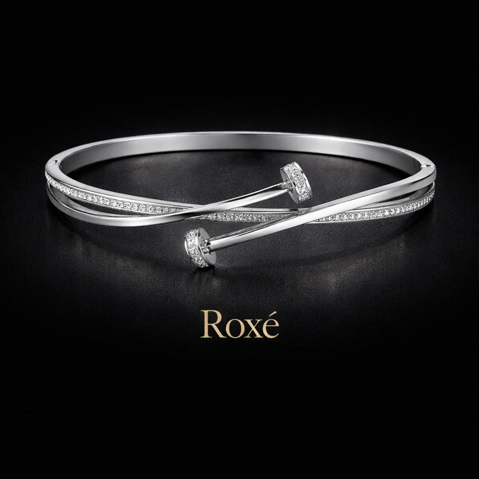 Bratara ROXE argintie eleganta cu design incrucisat si cristale inchizatoare fixa