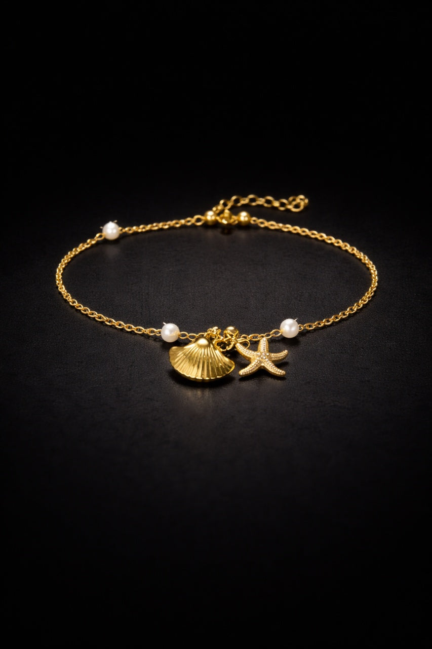 Brățară Roxé aurie cu perle și charm-uri marine (scoică & stea de mare)