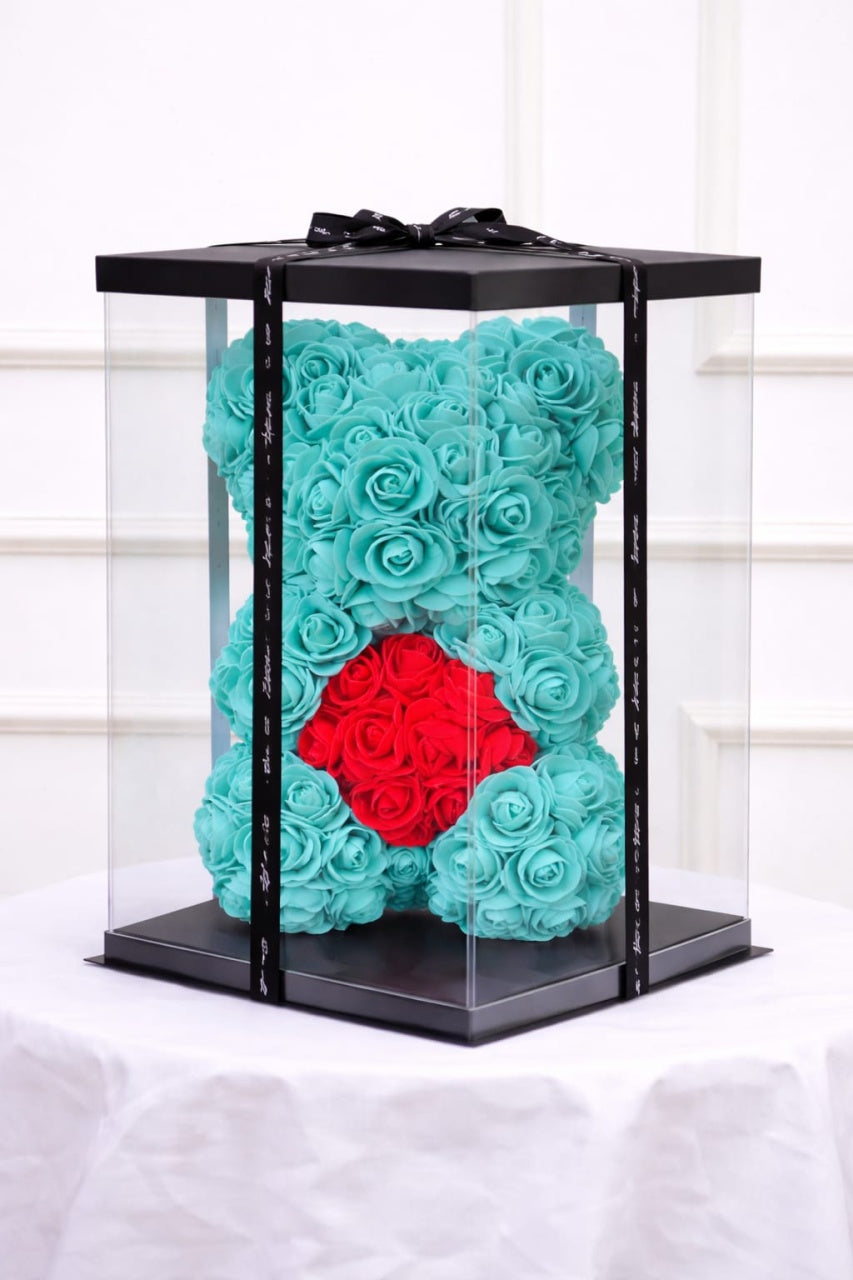 Ursulet decorativ din trandafiri din spuma verde menta cu inima rosie in cutie transparenta