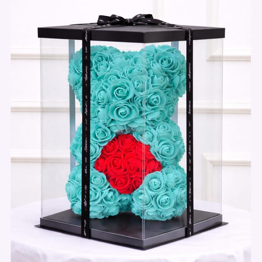 Ursulet decorativ din trandafiri din spuma verde menta cu inima rosie in cutie transparenta
