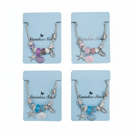 Bratara dama ROXE argintie cu charmuri marine si pandantive elegante, model chic