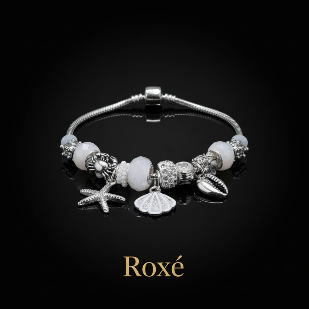 Bratara dama ROXE argintie cu charmuri marine si pandantive elegante, model chic