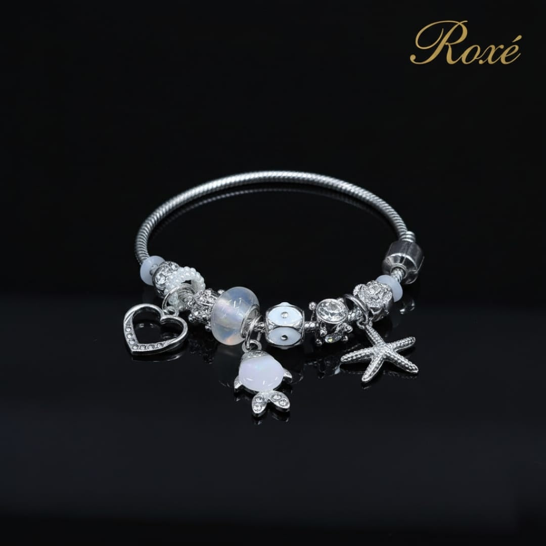 Bratara dama ROXE argintie cu charmuri pestisor si steluta, model elegant modern