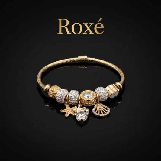 Bratara dama ROXE aurie cu charmuri marine si cristale, model elegant fashion