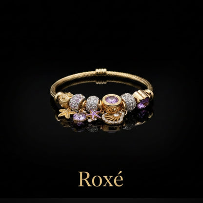 Bratara dama ROXE aurie cu charmuri marine si cristale, model elegant fashion