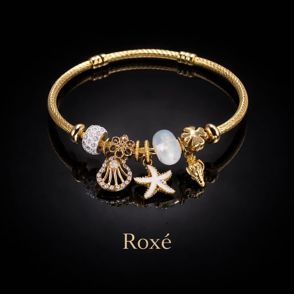 Bratara dama ROXE aurie cu charmuri marine stea de mare si scoica, eleganta