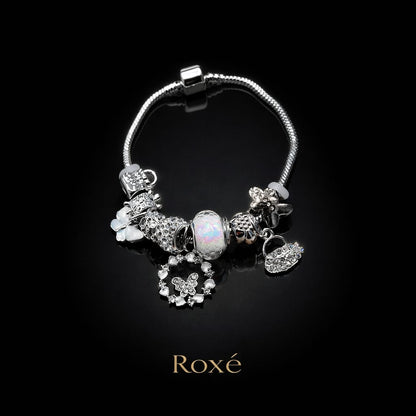 Bratara ROXE argintie cu fluture si posetuta charmuri elegante dama
