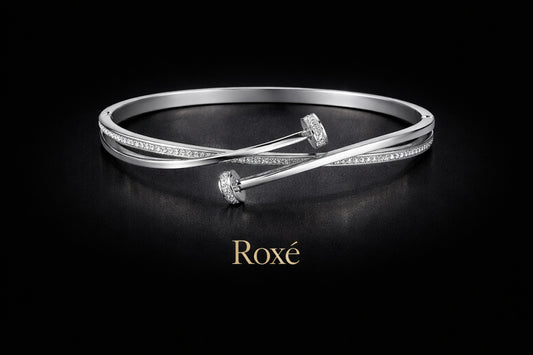Bratara ROXE argintie eleganta cu design incrucisat si cristale inchizatoare fixa