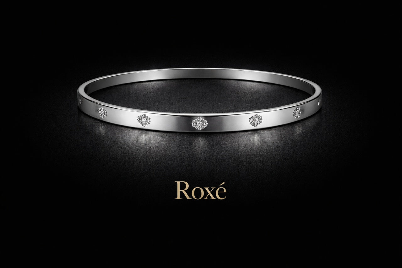 Bratara ROXE argintie rigida cu cristale discrete design elegant inchizatoare fixa