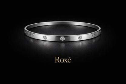 Bratara ROXE argintie rigida cu cristale discrete design elegant inchizatoare fixa