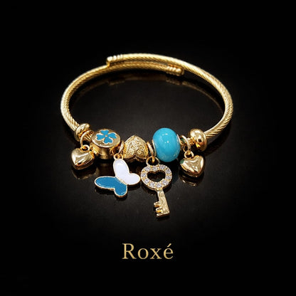 Bratara ROXE aurie cu fluturi cheita si charmuri elegante culori mixte