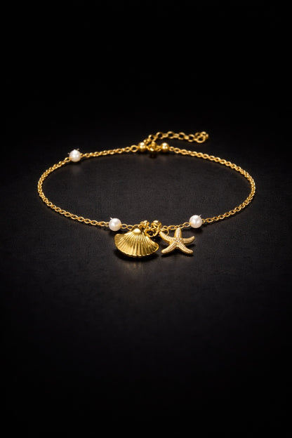 Brățară Roxé aurie cu perle și charm-uri marine (scoică & stea de mare)