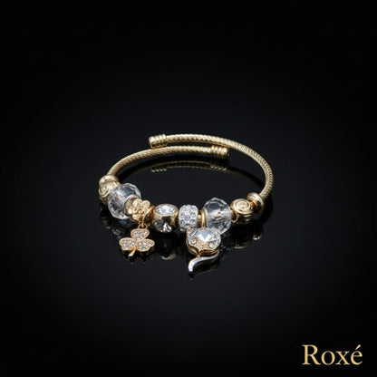 Bratara ROXE aurie cu pisicuta si trifoi charmuri elegante dama cadou stil modern