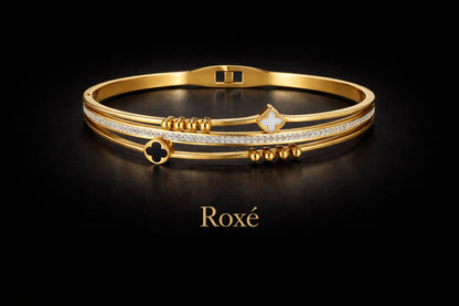Bratara ROXE aurie cu trifoi alb si negru si cristale design elegant inchizatoare fixa