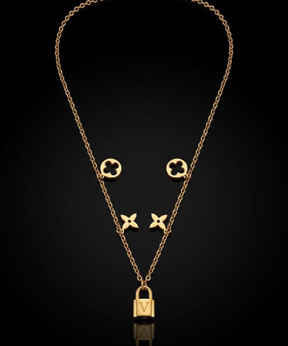 Colier ROXE Golden Lock Elegance – lanț dublu cu simboluri și pandantiv lacăt, design premium, 45 cm
