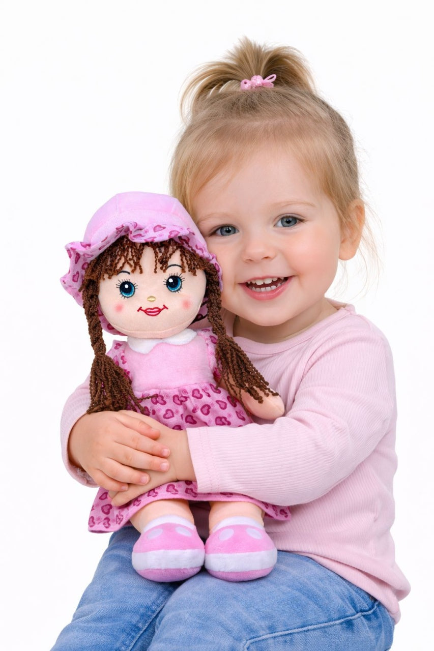 Papusa textila muzicala 40 cm, canta „Bau Bau”, rochie roz deschis cu inimioare, jucarie copii +3 ani