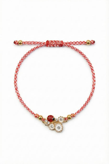 Set 12 bratari martisor cu floare alba si buburuza, snur rosu alb, ambalate individual