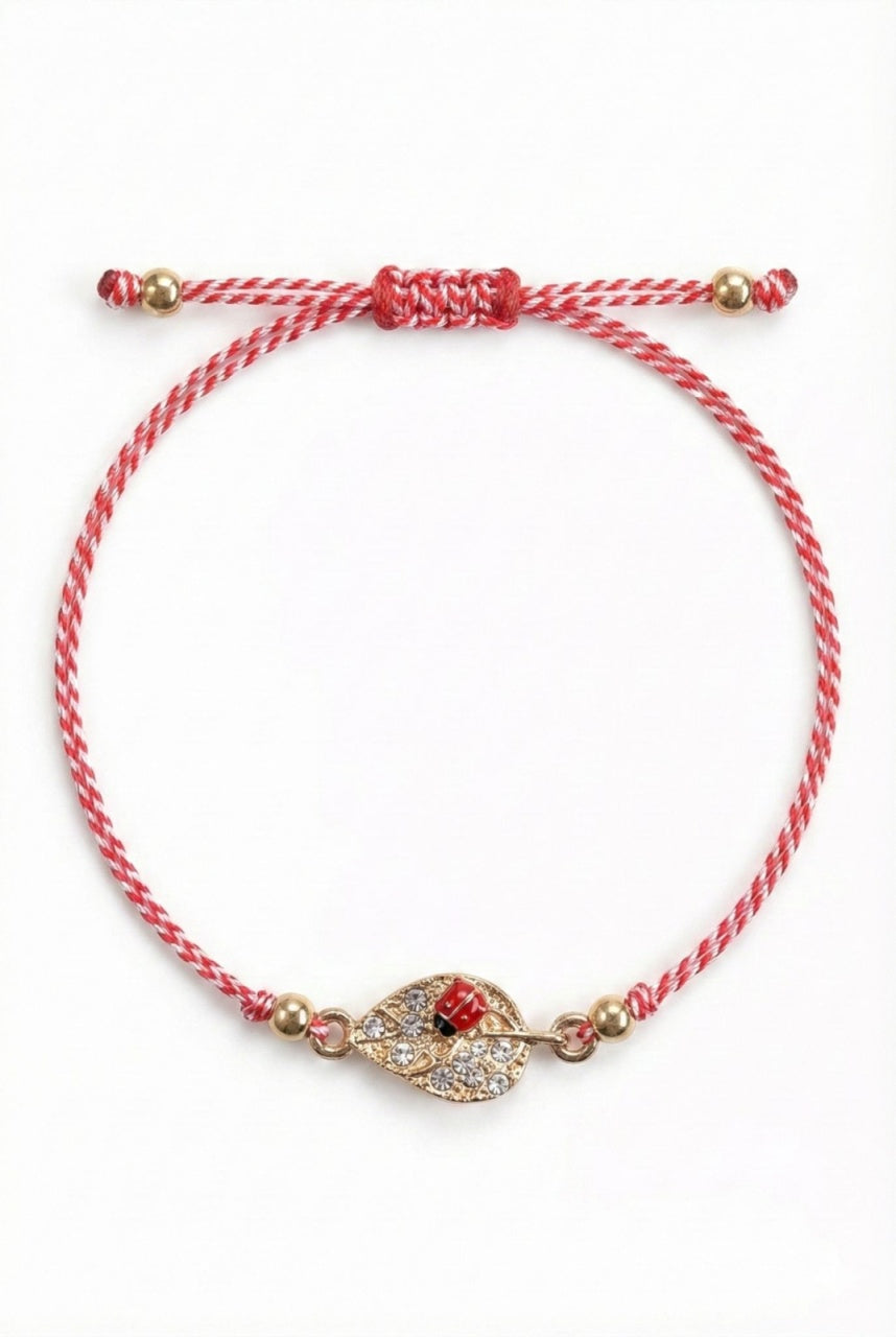 Set 12 bratari martisor cu frunza aurie cu strasuri si buburuza, snur rosu alb, ambalate individual