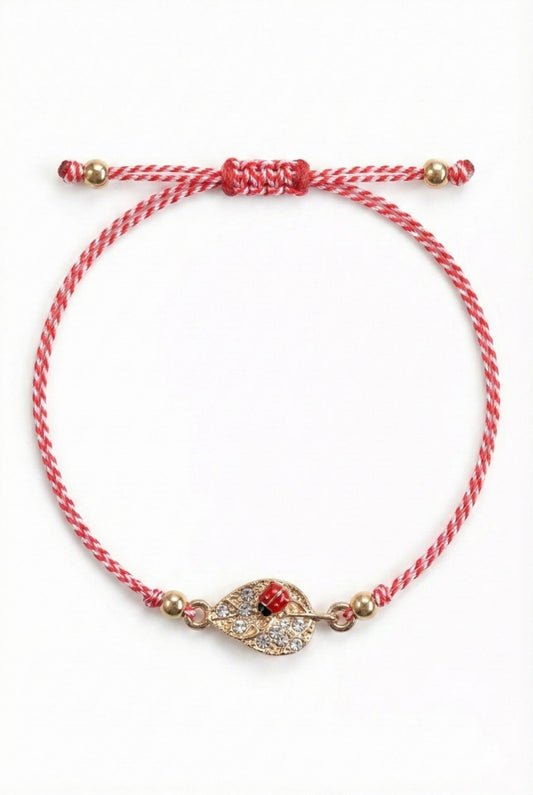 Set 12 bratari martisor cu frunza aurie cu strasuri si buburuza, snur rosu alb, ambalate individual