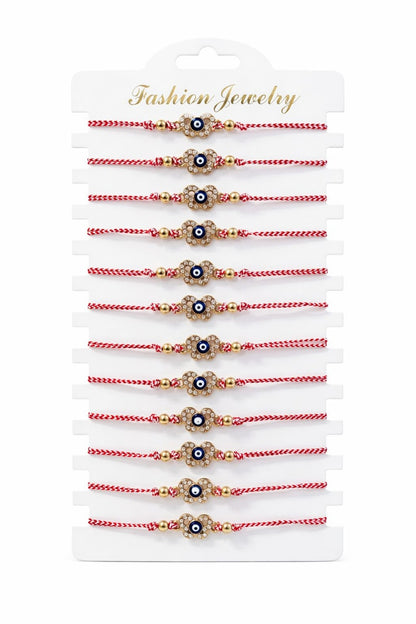 Set 12 bratari martisor fluture auriu cu strasuri si ochisor, snur alb rosu, 20x11cm