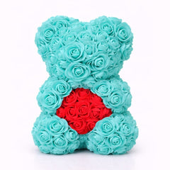 Ursulet decorativ din trandafiri din spuma verde menta cu inima rosie in cutie transparenta